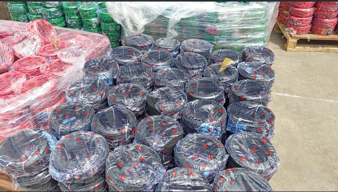 Color-coded electrical cable rolls ready for customer supply